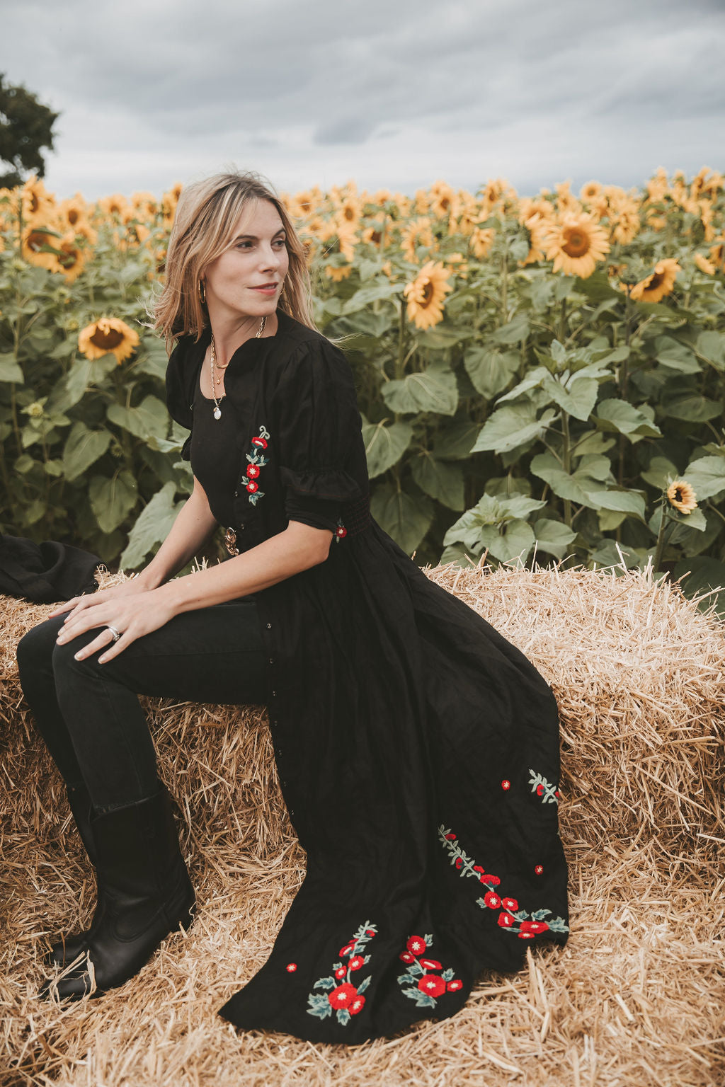 Black dress with embroidered flowers best sale